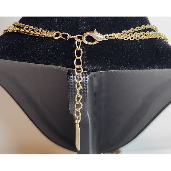 Gold Tone Apostrophe Cross Purple Rhinestone on Three Chain Necklace w/ Earrings - Picture 7 of 9